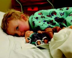 Child in hospital bed